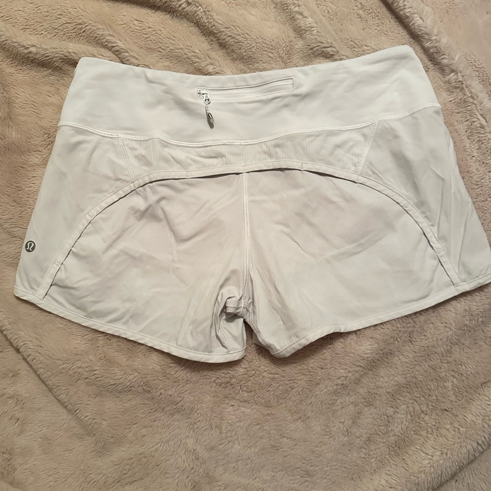 White speed up lululemon shorts. Size 8, 4in inseam
